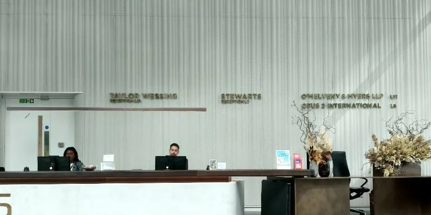 The reception desk, where staff said no such company was in the building.